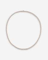Crystal Embrace goudkleurig tennis ketting, symbool voor zuiverheid en sprankelende energie.