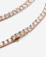 Crystal Embrace Rosé goudkleurig tennis ketting met sprankelende energie en symboliek van zuiverheid.