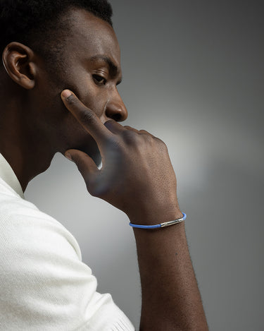 Noirèa silberfarbenes hellblaues Armband 4mm.