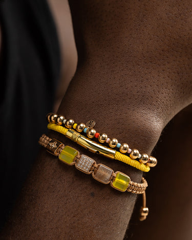 Noirèa Goudkleurig Geel Armband 3mm, handgemaakte sieraden op een herenarm, luxe heren sieraden.