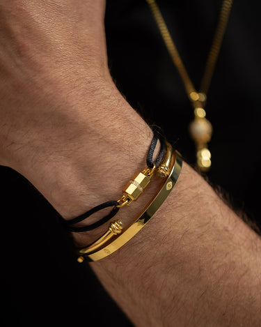 Handgemaakte sieraden: Midnight Lock Zwart Armband Goudkleurig. Luxe heren sieraden met premium kwaliteit.