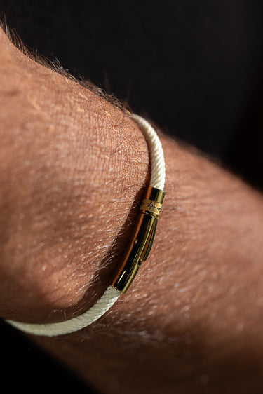 Noirèa goldfarben weißes Armband 4mm.