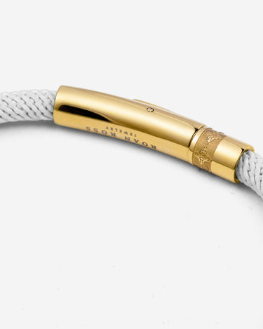 Noirèa goldfarben weißes Armband 4mm.