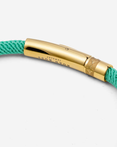 Noirèa goldfarbenes grünes Armband 4mm.