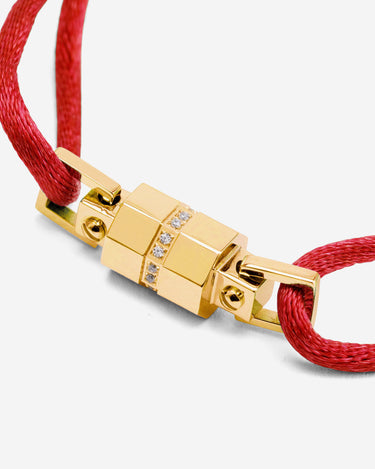 Midnight Lock Rood Armband Goudkleurig met luxe sluiting en diamanten details. Handgemaakte sieraden.