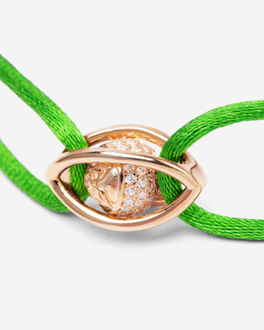 Emerald Guardian Groen Armband met rosé goudkleurig oog en zirconia steen, handgemaakte sieraden.