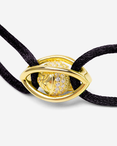 Emerald Guardian Zwart Armband met Goudkleurig oog en zirconia steen, handgemaakte sieraden, luxe heren sieraden.