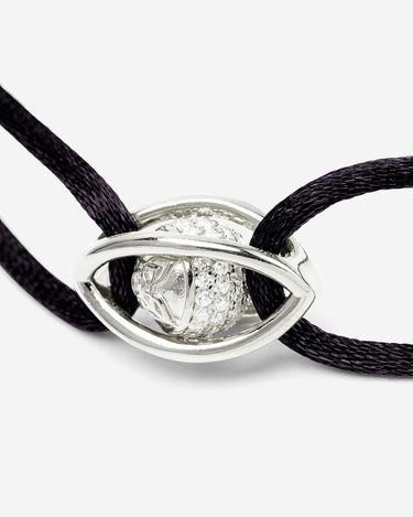 Emerald Guardian Zwart Armband met zilveren oog en zirconia steen, handgemaakte luxe heren sieraden.