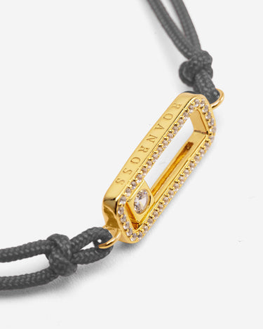 Celestial Balance Goud Grijs Armband met fonkelende zirkonia steentjes en luxe uitstraling.