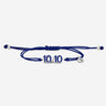 Zilverkleurige Donkerblauwe 10:10 Armband, symboliseert manifestatie en succes.