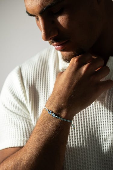 10:10 Liora Gold-Colored Light Blue Bracelet